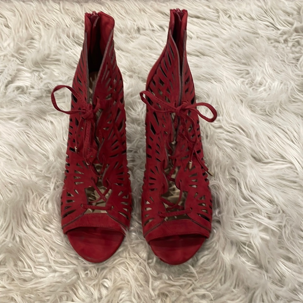 The brand is Charlotte Russe and a maroon red
